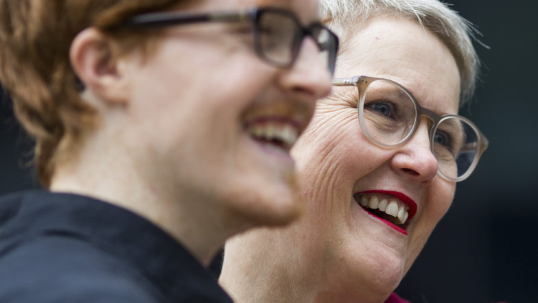 Woman and man talking and laughing.