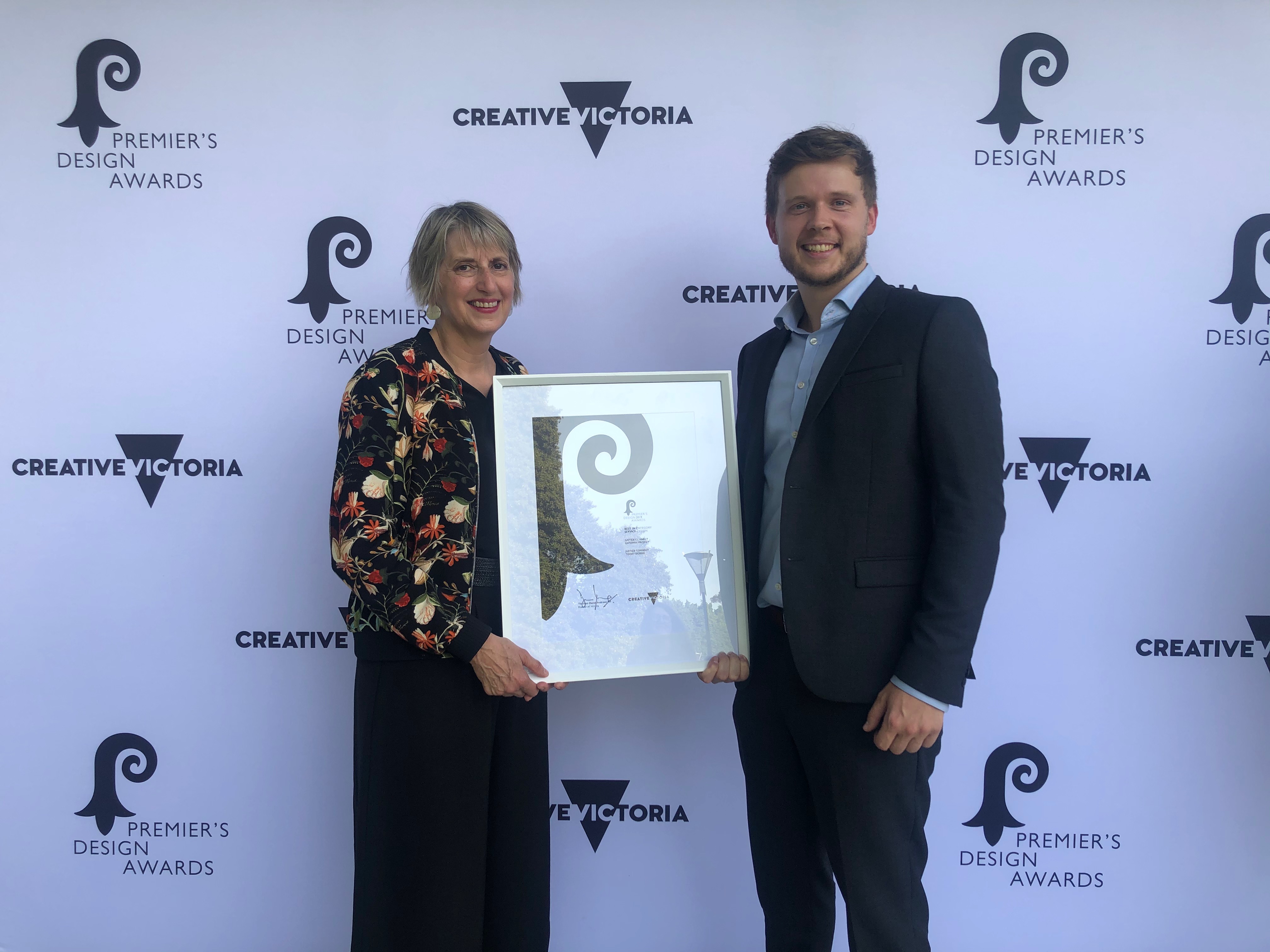 Tom and Sue collecting the Premier's Design Award
