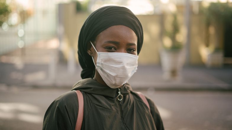 Image of African woman wearing face mask